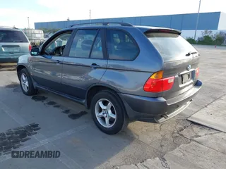 2003 BMW X5 3.0i with VIN 5UXFA53573LV83812, listed as a IAAI auction lot 41590046 with 166,841 mi miles. Bid and sale history available at carsss.com. Image 3.