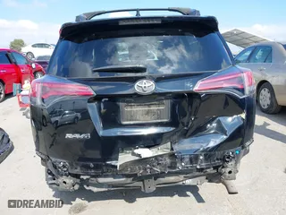 2018 Toyota RAV4 LE with VIN 2T3ZFREVXJW457751, listed as a IAAI auction lot 41529251 with 230,054 mi miles. Bid and sale history available at carsss.com. Image 17.