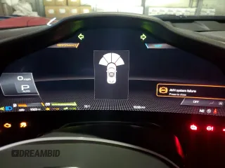 2023 Ferrari SF90 z VIN ZFF95NLA9P0296772, wystawiony jako Copart lot #77435564 z przebiegiem 1523 mil mil oraz Szkody całkowita. Historia ofert i sprzedaży dostępna na DreamBid. Obrazek 9.