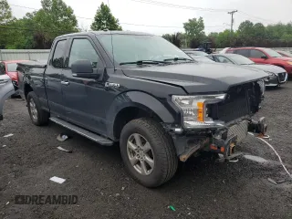 2018 Ford F-150 XL with VIN 1FTEX1EP8JFB61160, listed as a Copart auction lot 59914935 with 97,564 mi miles and Salvage title. Bid and sale history available at DreamBid. Image 4.