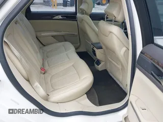 2013 Lincoln MKZ z VIN 3LN6L2GK9DR811737, wystawiony jako IAAI lot #42011896 z przebiegiem 100 669 mil mil oraz . Historia ofert i sprzedaży dostępna na DreamBid. Obrazek 8.