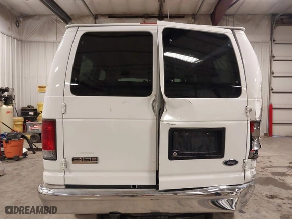 2007 Ford Econoline Wagon XL with VIN 1FMNE11L87DA58507, listed as a IAAI auction lot 41128969 with 143,383 mi miles. Bid and sale history available at carsss.com. Image 6.