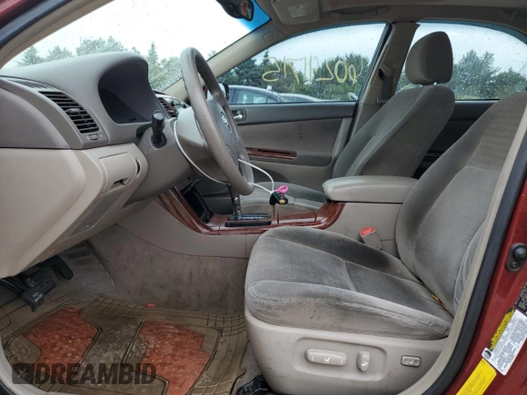 2005 Toyota Camry LE with VIN 4T1BE30KX5U086586, listed as a Copart auction lot 60291715 with 180,421 mi miles and Salvage title. Bid and sale history available at DreamBid. Image 7.