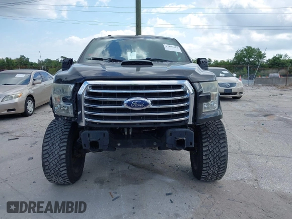 2015 Ford F-150 XLT with VIN 1FTEW1C81FFB05261, listed as a IAAI auction lot 42193554 with Not Provided miles and . Bid and sale history available at carsss.com. Image 12.