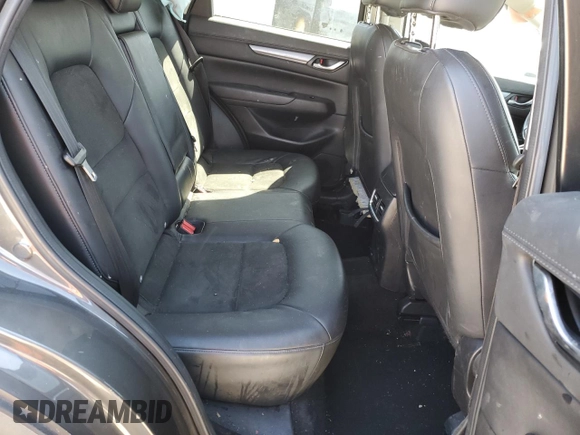 2017 Mazda CX-5 Touring with VIN JM3KFACL1H0100436, listed as a Copart auction lot 53058875 with 77,205 mi miles and Salvage Title. Bid and sale history available at DreamBid. Image 11.