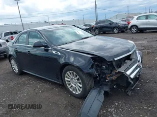 2011 Cadillac CTS z VIN 1G6DC5EY9B0153096, wystawiony jako IAAI lot #42146595 z przebiegiem 148 990 mil mil oraz . Historia ofert i sprzedaży dostępna na DreamBid. Obrazek 1.