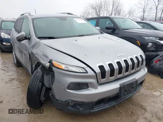 2016 Jeep Cherokee Latitude with VIN 1C4PJLCB7GW273440, listed as a IAAI auction lot 41452456 with 106,048 mi miles. Bid and sale history available at carsss.com. Image 1.