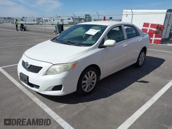 2009 Toyota Corolla with VIN JTDBL40E29J001368, listed as a IAAI auction lot 41777597 with 289,079 mi miles. Bid and sale history available at carsss.com. Image 2.