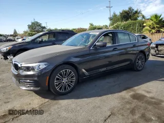 2020 BMW 5 Series 530e with VIN WBAJA9C08LCD44034, listed as a Copart auction lot 63664454 with 97,595 mi miles and Salvage Title. Bid and sale history available at DreamBid. Image 1.