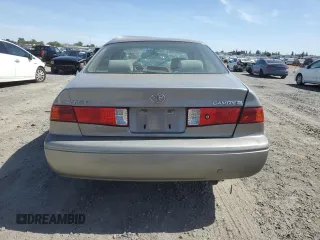 2001 Toyota Camry CE z VIN JT2BG22K410568101, wystawiony jako Copart lot #57184125 z przebiegiem Nie podano mil oraz Szkoda całkowita • Salvage title. Historia ofert i sprzedaży dostępna na DreamBid. Obrazek 6.