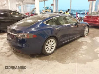 2018 Tesla Model S 75D with VIN 5YJSA1E24JF276044, listed as a IAAI auction lot 41798530 with 53,462 mi miles and . Bid and sale history available at DreamBid. Image 4.