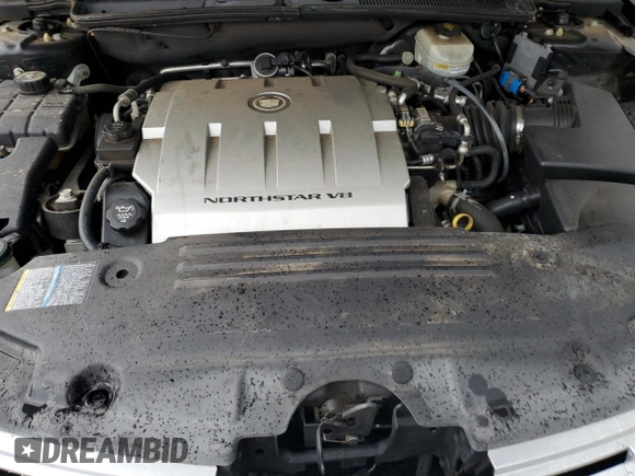 2006 Cadillac DTS Professional z VIN 1GEEH06Y86U500282, wystawiony jako Copart lot #81234904 z przebiegiem 61 611 mil mil oraz Szkoda całkowita • Salvage title. Historia ofert i sprzedaży dostępna na DreamBid. Obrazek 12.