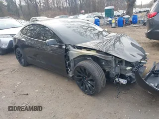 2023 Tesla Model 3 Long Range with VIN 5YJ3E1EB6PF673532, listed as a IAAI auction lot 41885716 with 39,690 mi miles and . Bid and sale history available at DreamBid. Image 1.