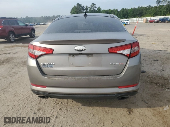 2013 Kia Optima SX с VIN 5XXGR4A6XDG248081, выставлен на аукционе Copart как лот 55997735 с пробегом 122 088 миль миль и Списание • Salvage title. История ставок и продаж доступна на DreamBid. Изображение 6.