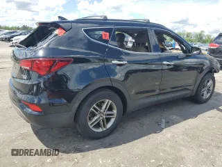 2017 Hyundai Santa Fe 2.4L z VIN 5NMZUDLB9HH013230, wystawiony jako Copart lot #55888975 z przebiegiem Nie podano mil oraz Szkoda całkowita • Salvage title. Historia ofert i sprzedaży dostępna na DreamBid. Obrazek 3.