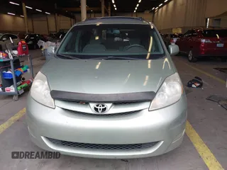 2007 Toyota Sienna XLE with VIN 5TDZK22C37S023719, listed as a IAAI auction lot 41566286 with 239,296 mi miles. Bid and sale history available at carsss.com. Image 12.