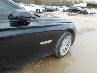 2009 BMW 7 Series 750i with VIN WBAKA83509CY33415, listed as a IAAI auction lot 41351385 with 108,141 mi miles. Bid and sale history available at carsss.com. Image 1.