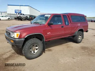 1991 Toyota Pickup DLX z VIN JT4VN13D8M5046082, wystawiony jako Copart lot #53050695 z przebiegiem 184 411 mil mil oraz Czysty tytuł • Clean title. Historia ofert i sprzedaży dostępna na DreamBid. Obrazek 1.