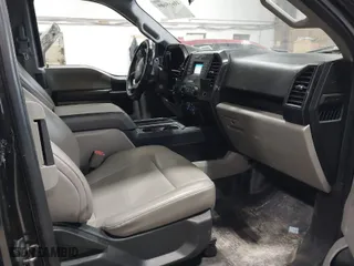 2015 Ford F-150 XLT with VIN 1FTEX1EP4FKE23397, listed as a IAAI auction lot 41665609 with 150,021 mi miles. Bid and sale history available at carsss.com. Image 5.