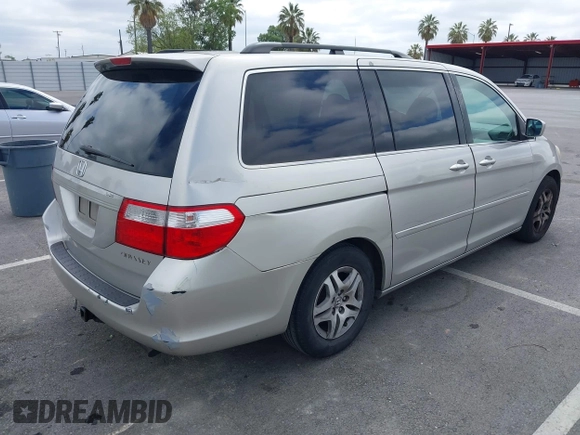 2005 Honda Odyssey EX-L with VIN 5FNRL38745B075486, listed as a IAAI auction lot 42080772 with 197,158 mi miles and . Bid and sale history available at DreamBid. Image 4.