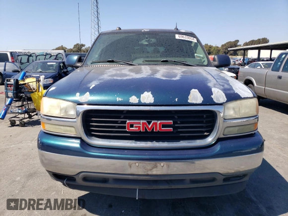 2005 GMC Yukon SLE with VIN 1GKEC13TX5J161244, listed as a Copart auction lot 69633054 with 268,064 mi miles and Clean Title. Bid and sale history available at carsss.com. Image 5.