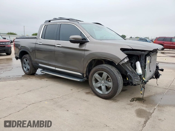 2022 Honda Ridgeline RTL-E с VIN 5FPYK3F75NB000675, выставлен на аукционе Copart как лот 58730835 с пробегом 32 161 миль миль и Списание • Salvage title. История ставок и продаж доступна на DreamBid. Изображение 4.
