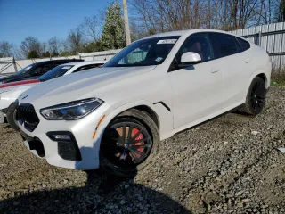 2021 BMW X6 M50i z VIN 5UXCY8C08M9E79190, wystawiony jako Copart lot #52417935 z przebiegiem 81 036 mil mil oraz Szkoda całkowita • Salvage title. Historia ofert i sprzedaży dostępna na DreamBid. Obrazek 1.