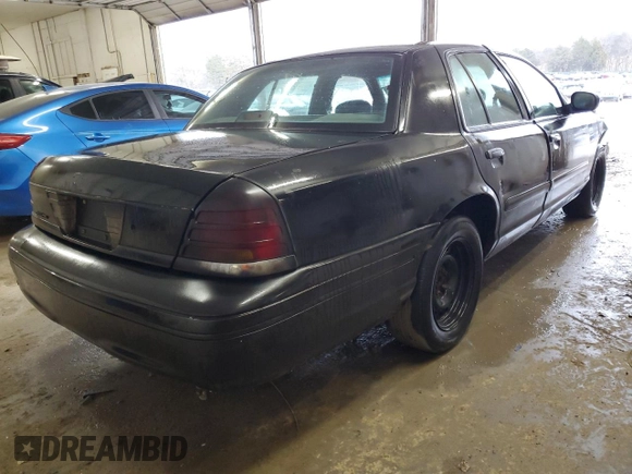 1999 Ford Crown Victoria Police с VIN 2FAFP71W7XX105850, выставлен на аукционе Copart как лот 43760905 с пробегом 308 252 миль миль и Списание • Salvage title. История ставок и продаж доступна на DreamBid. Изображение 3.