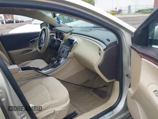 2011 Buick LaCrosse CX z VIN 1G4GA5EC6BF232951, wystawiony jako IAAI lot #42157969 z przebiegiem 73 671 mil mil oraz . Historia ofert i sprzedaży dostępna na DreamBid. Obrazek 5.