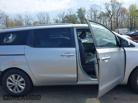 2017 Kia Sedona LX with VIN KNDMB5C17H6292641, listed as a IAAI auction lot 42010175 with 95,247 mi miles. Bid and sale history available at carsss.com. Image 13.