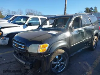 2002 Toyota Sequoia Limited with VIN 5TDBT48A62S065455, listed as a IAAI auction lot 41283729 with 292,887 mi miles. Bid and sale history available at carsss.com. Image 2.