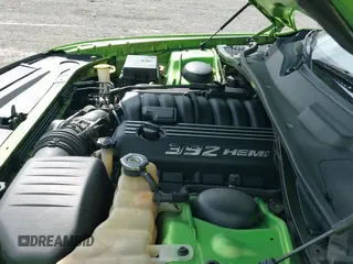 2011 Dodge Challenger SRT-8 with VIN 2B3CJ7DJ5BH596289, listed as a IAAI auction lot 43304389 with 104,592 mi miles and . Bid and sale history available at DreamBid. Image 20.