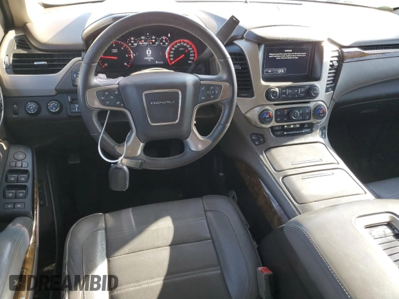 2015 GMC Yukon Denali with VIN 1GKS2CKJ0FR508598, listed as a Copart auction lot 71212924 with 133,220 mi miles and Salvage Title. Bid and sale history available at carsss.com. Image 8.