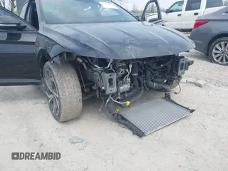2023 Volkswagen Jetta GLI Autobahn z VIN 3VW2T7BU2PM054137, wystawiony jako IAAI lot #42029063 z przebiegiem 17 456 mil mil oraz . Historia ofert i sprzedaży dostępna na DreamBid. Obrazek 6.
