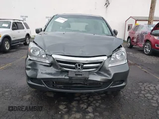 2007 Honda Odyssey EX-L z VIN 5FNRL386X7B445642, wystawiony jako IAAI lot #40652844 z przebiegiem 202 622 mil mil oraz . Historia ofert i sprzedaży dostępna na DreamBid. Obrazek 6.