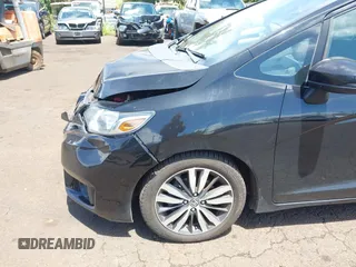 2015 Honda Fit EX-L with VIN 3HGGK5H89FM706018, listed as a IAAI auction lot 42417637 with 36,556 mi miles and . Bid and sale history available at DreamBid. Image 17.