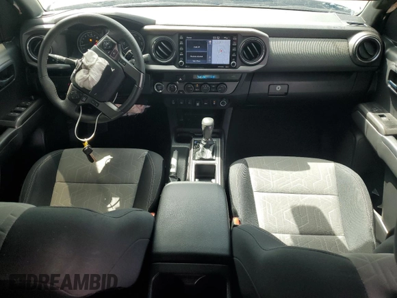 2023 Toyota Tacoma SR z VIN 3TMCZ5AN7PM593826, wystawiony jako Copart lot #50483285 z przebiegiem 14 957 mil mil oraz Szkoda całkowita • Salvage title. Historia ofert i sprzedaży dostępna na DreamBid. Obrazek 8.