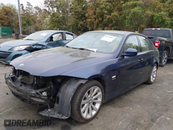 2011 BMW 3 Series 328i xDrive with VIN WBAPK5C50BA658103, listed as a IAAI auction lot 41948893 with 122,283 mi miles. Bid and sale history available at carsss.com. Image 2.