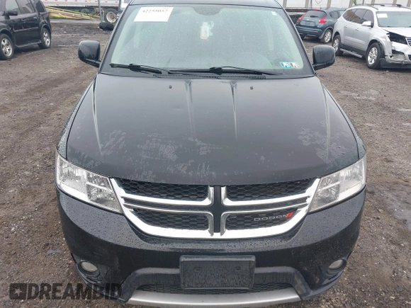 2014 Dodge Journey Limited with VIN 3C4PDDDG4ET141164, listed as a IAAI auction lot 42255057 with 195,135 mi miles and . Bid and sale history available at DreamBid. Image 6.