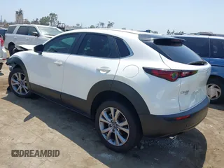 2021 Mazda CX-30 Select with VIN 3MVDMBBL9MM313039, listed as a IAAI auction lot 42575424 with 21,083 mi miles and . Bid and sale history available at DreamBid. Image 3.