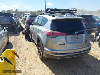 2018 Toyota RAV4 XLE with VIN 2T3WFREV5JW446272, listed as a IAAI auction lot 41897596 with 91,899 mi miles. Bid and sale history available at carsss.com. Image 3.
