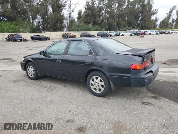 2000 Toyota Camry LE z VIN 4T1BF22K9YU949936, wystawiony jako Copart lot #54782815 z przebiegiem 239 139 mil mil oraz Szkoda całkowita • Salvage title. Historia ofert i sprzedaży dostępna na DreamBid. Obrazek 2.