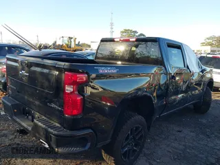 2024 Chevrolet Silverado 1500 Custom Trail Boss with VIN 3GCUDCED2RG375626, listed as a IAAI auction lot 41231846 with 4,565 mi miles. Bid and sale history available at carsss.com. Image 4.