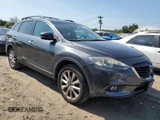 2015 Mazda CX-9 Grand Touring with VIN JM3TB3DV1F0461061, listed as a Copart auction lot 67194994 with 87,637 mi miles and Salvage Title. Bid and sale history available at carsss.com. Image 4.