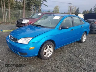 2007 Ford Focus S with VIN 1FAHP34N27W161713, listed as a IAAI auction lot 41966335 with 154,007 mi miles and . Bid and sale history available at carsss.com. Image 2.