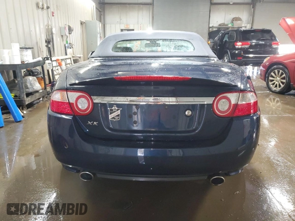 2007 Jaguar XK with VIN SAJDA44BX75B00447, listed as a Copart auction lot 50147695 with 119,467 mi miles and Salvage Title. Bid and sale history available at carsss.com. Image 6.