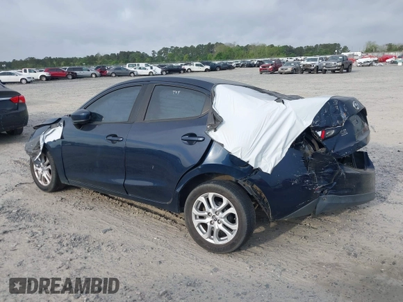 2016 Scion iA with VIN 3MYDLBZV1GY129384, listed as a IAAI auction lot 41978059 with 166,182 mi miles. Bid and sale history available at carsss.com. Image 3.