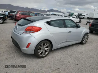 2016 Hyundai Veloster z VIN KMHTC6AD6GU298223, wystawiony jako Copart lot #54957445 z przebiegiem 92 525 mil mil oraz Czysty tytuł • Clean title. Historia ofert i sprzedaży dostępna na DreamBid. Obrazek 3.