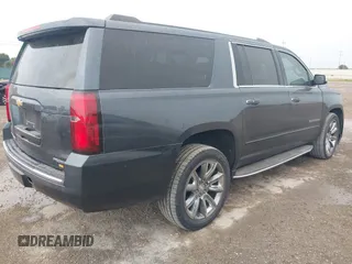 2020 Chevrolet Suburban Premier with VIN 1GNSCJKC8LR290783, listed as a IAAI auction lot 42636126 with 59,371 mi miles and . Bid and sale history available at DreamBid. Image 4.