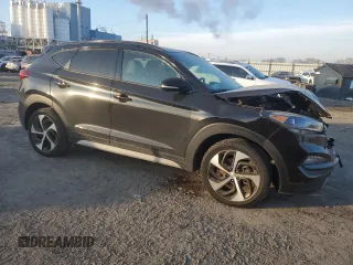 2017 Hyundai Tucson Sport with VIN KM8J3CA25HU572940, listed as a Copart auction lot 87414304 with 56,854 mi miles and Salvage Title. Bid and sale history available at DreamBid. Image 4.